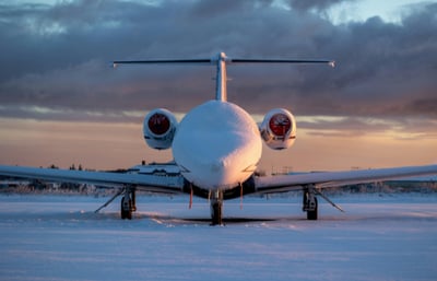 Airplane covered in snow and ice.