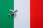 Italian flag with airplane figurine.